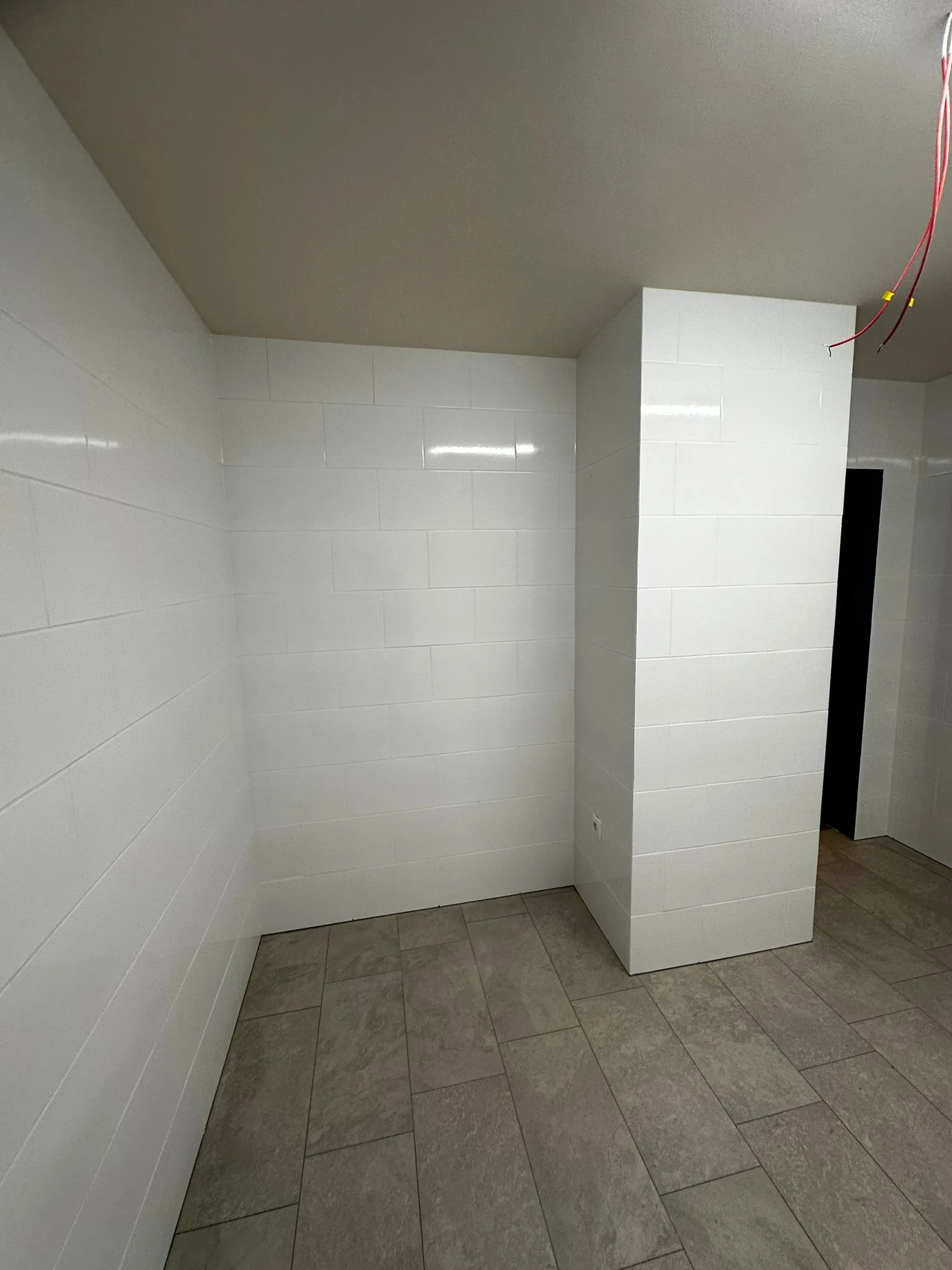 Tiled space with light walls