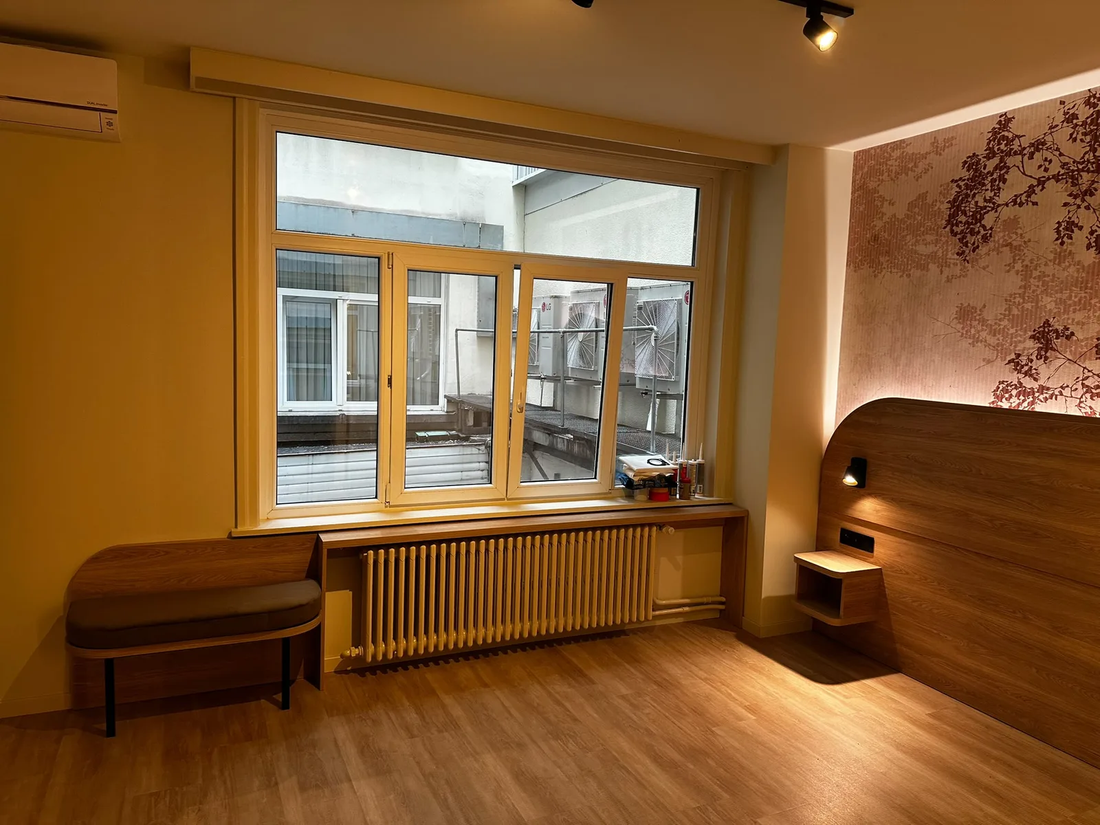 Window-side bench and wood-look finishes