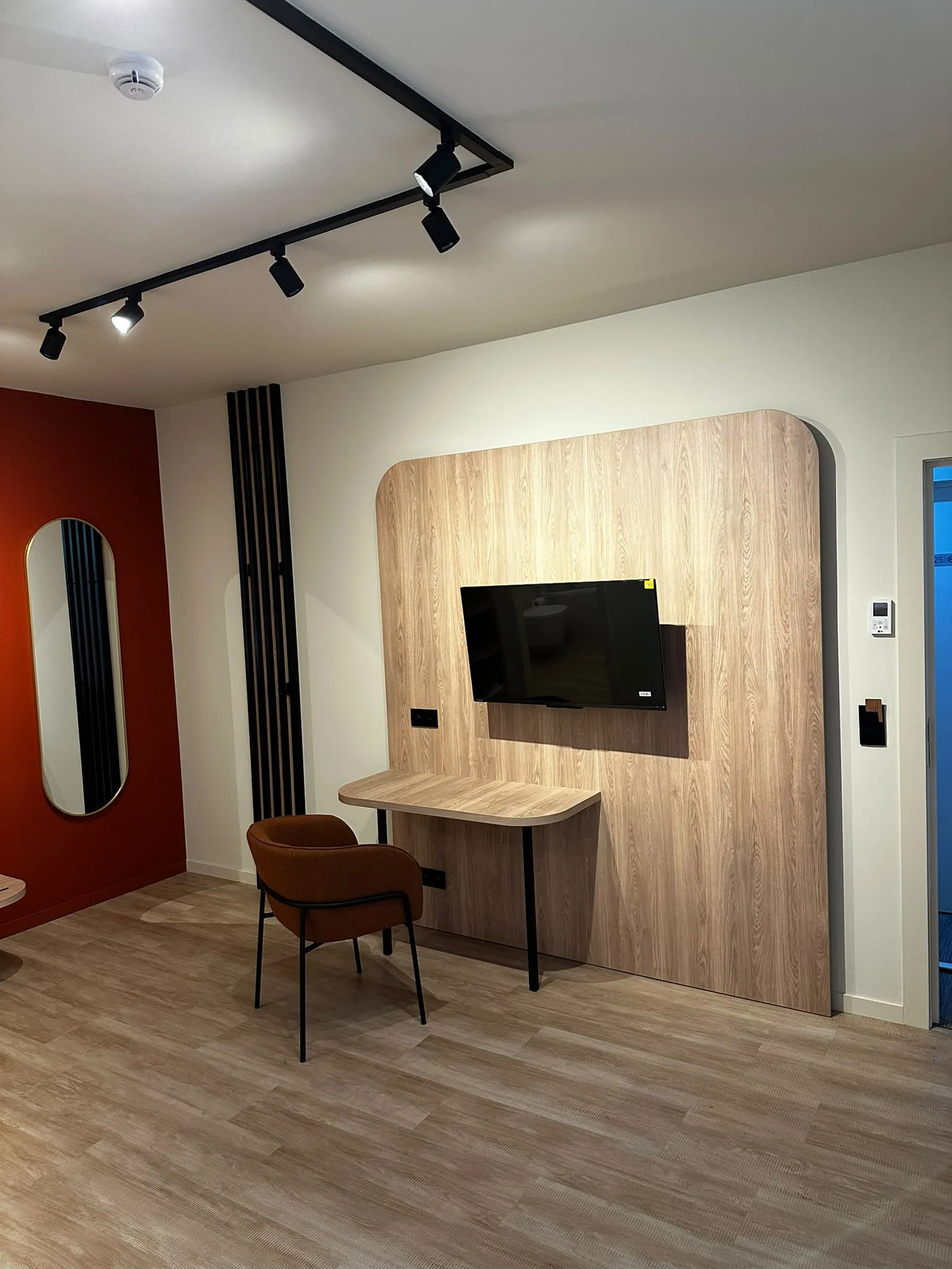 TV panel, matching desk and track lighting