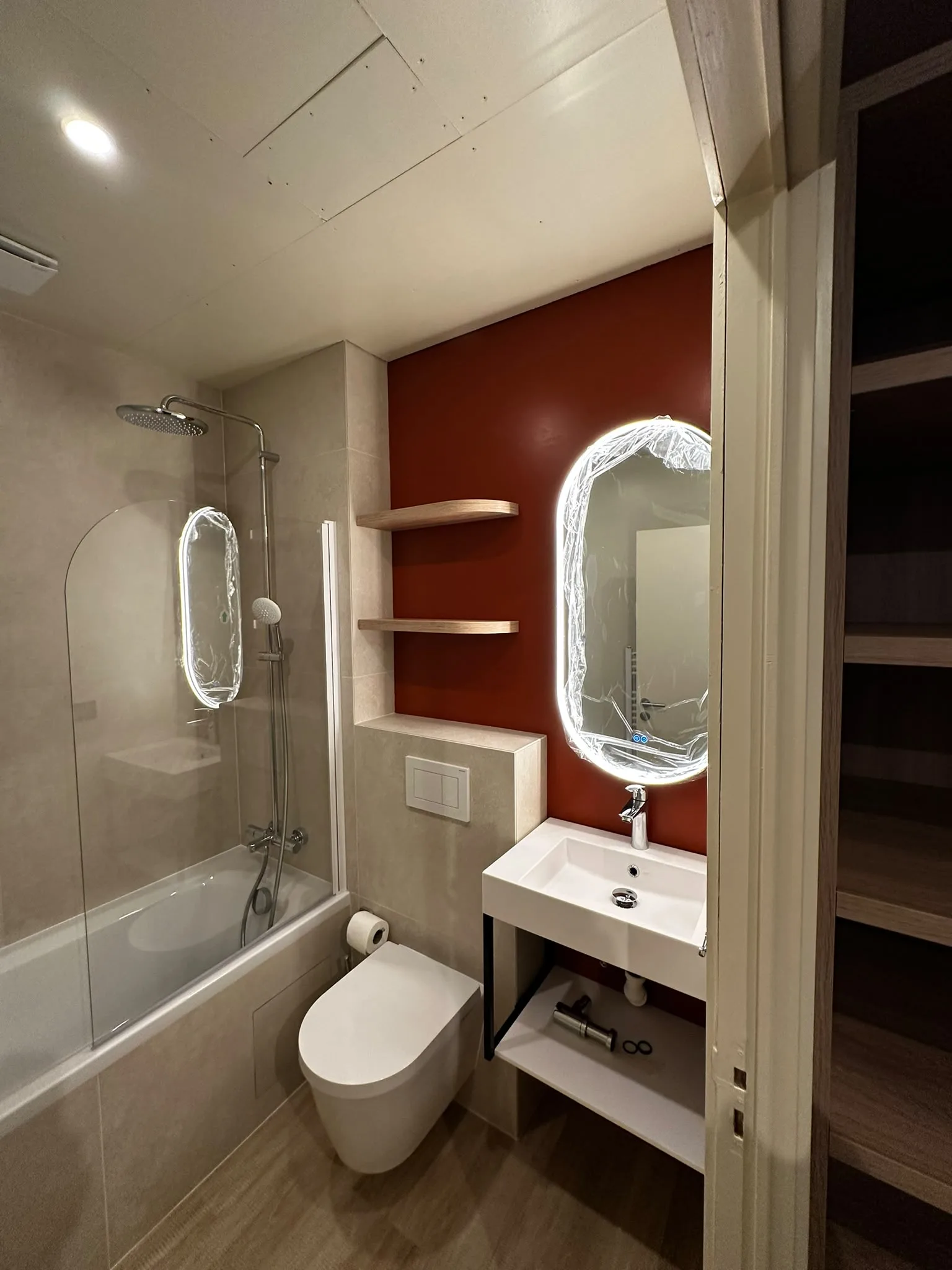 Rectangular basin, illuminated mirror and chrome fittings