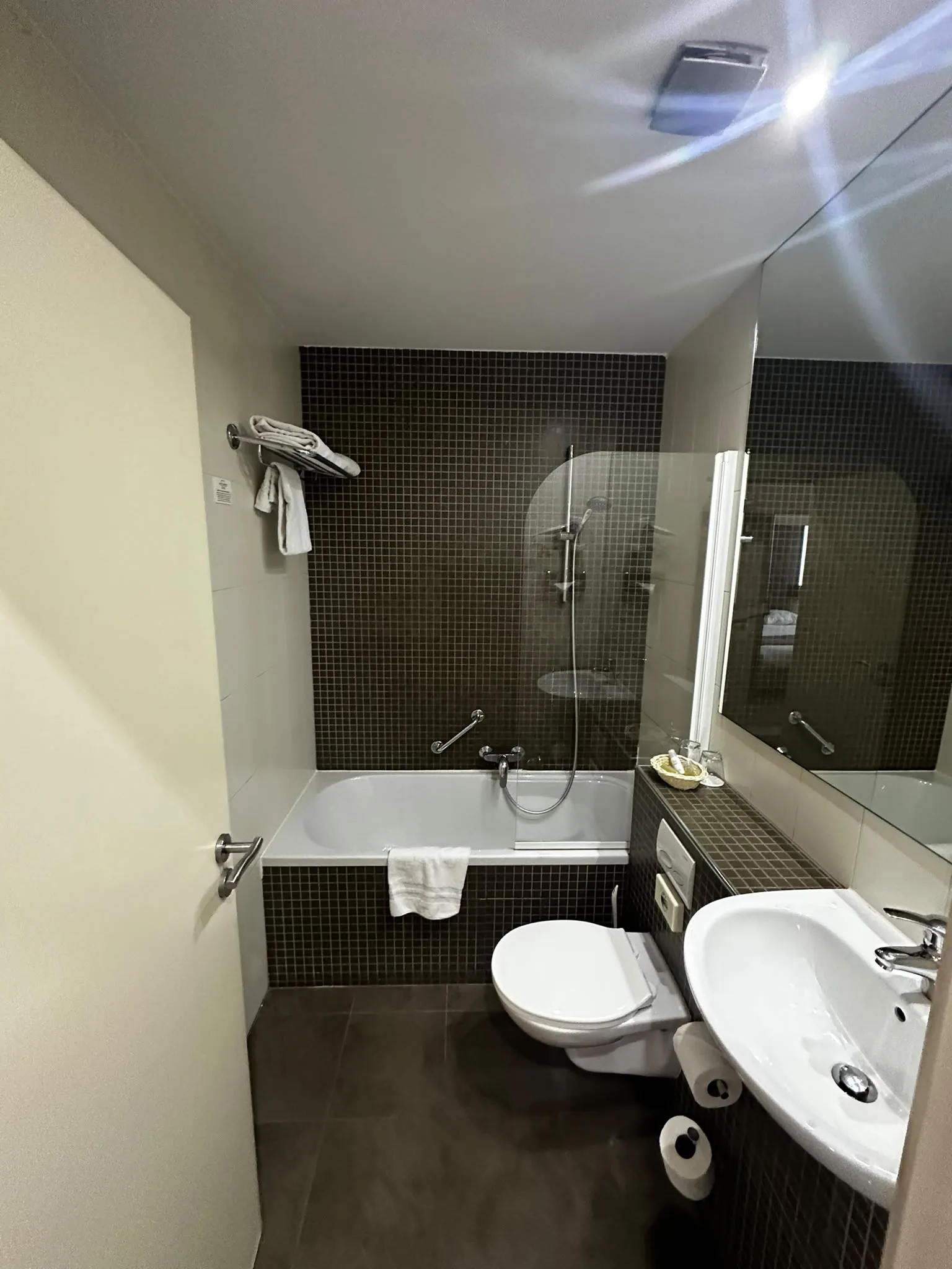 Previous bath, glass screen and wall-hung toilet
