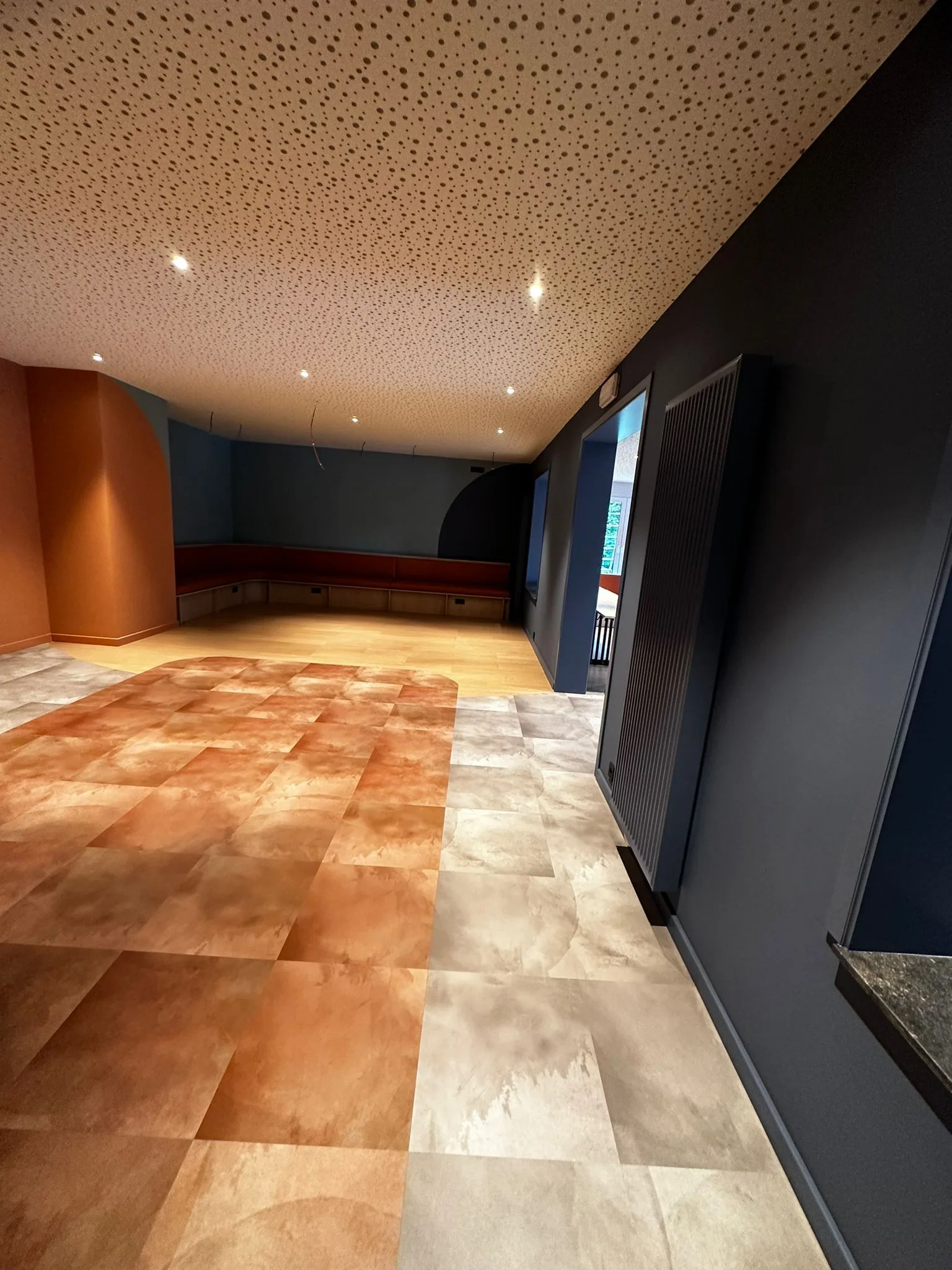 Hotel interior with blue and terracotta accents