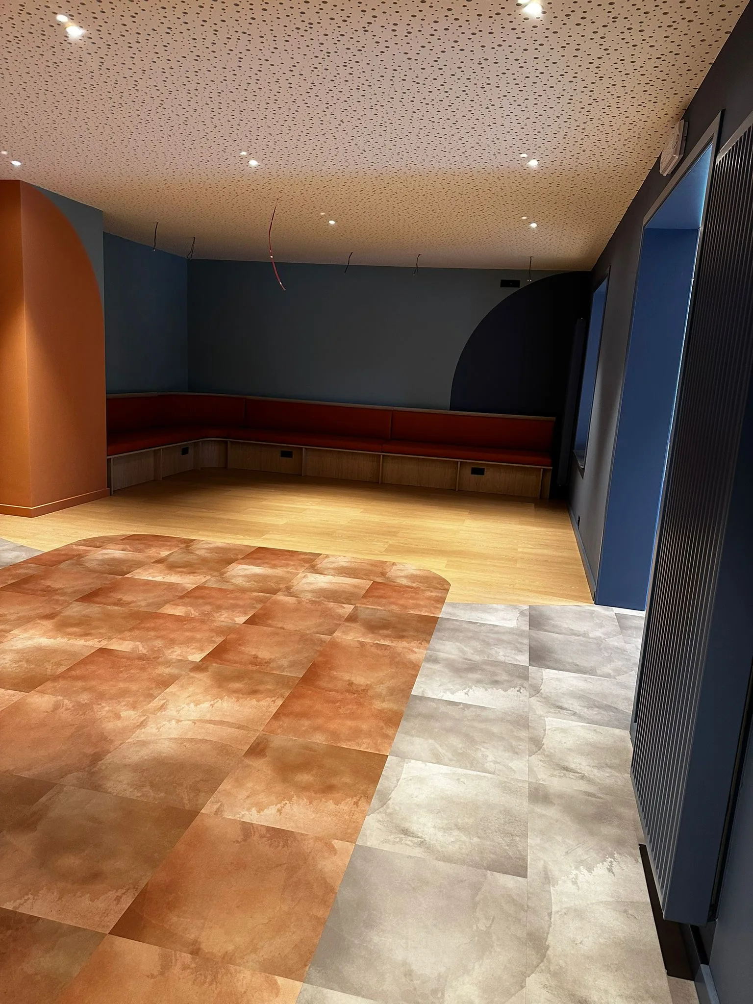 Hotel interior with blue and terracotta accents