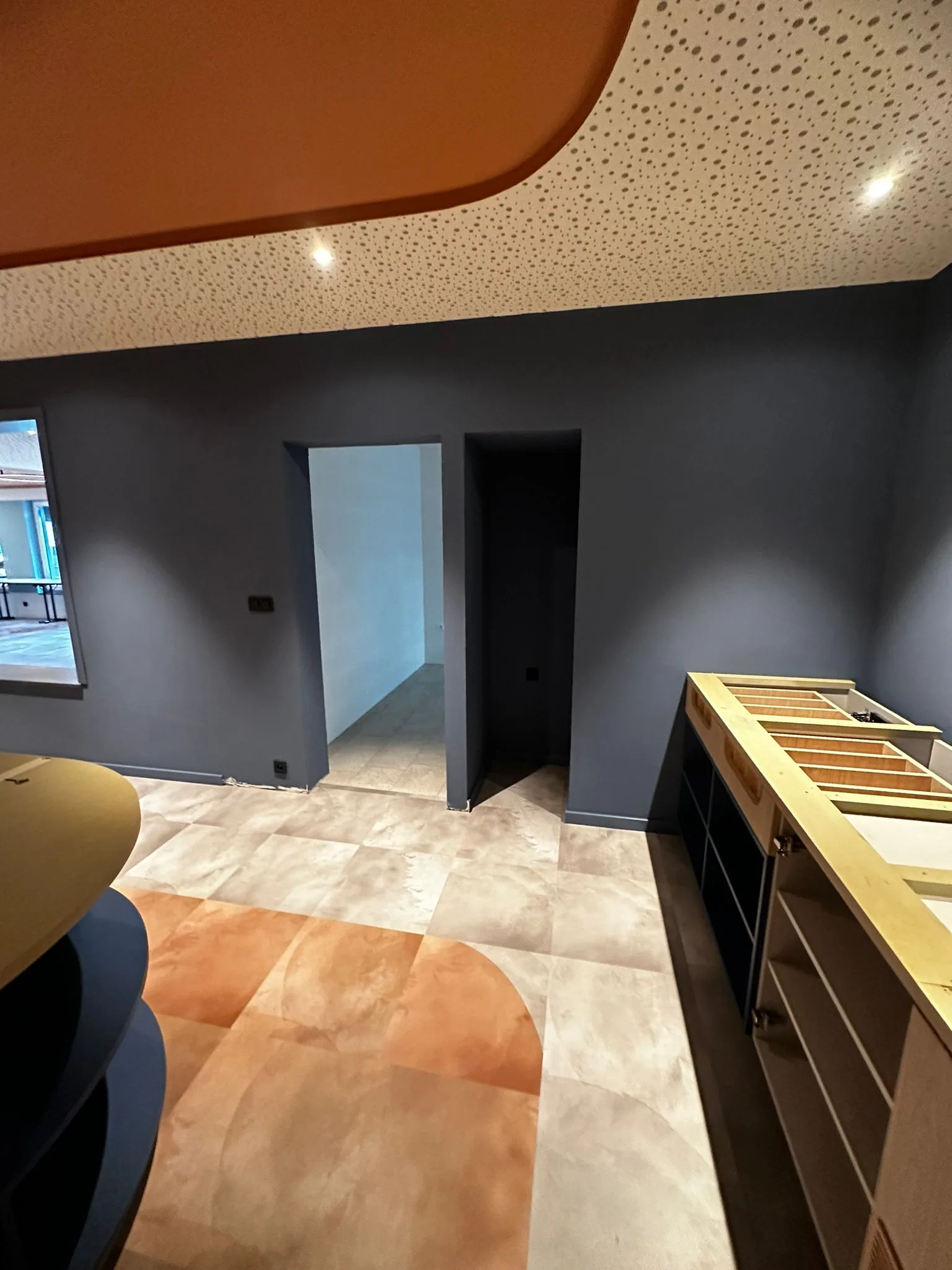 Hotel interior with blue and terracotta accents