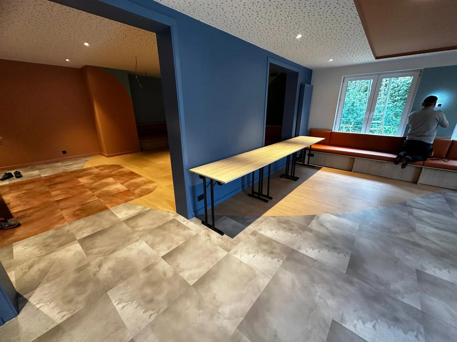 Hotel interior with blue and terracotta accents