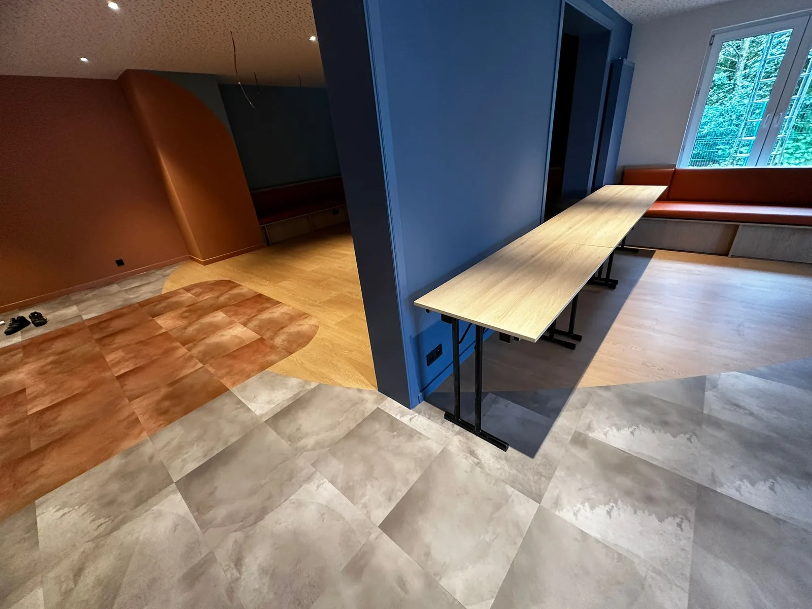 Hotel interior with blue and terracotta accents