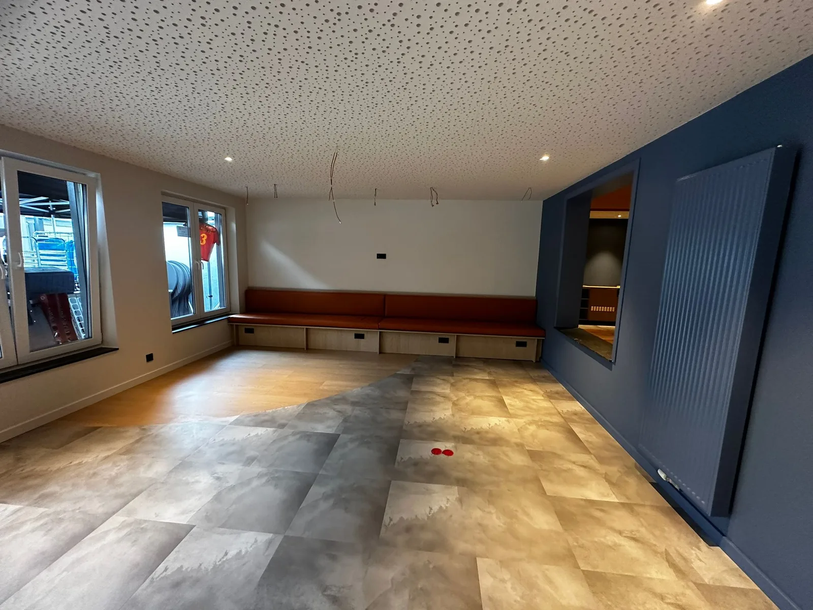 Hotel interior with blue and terracotta accents