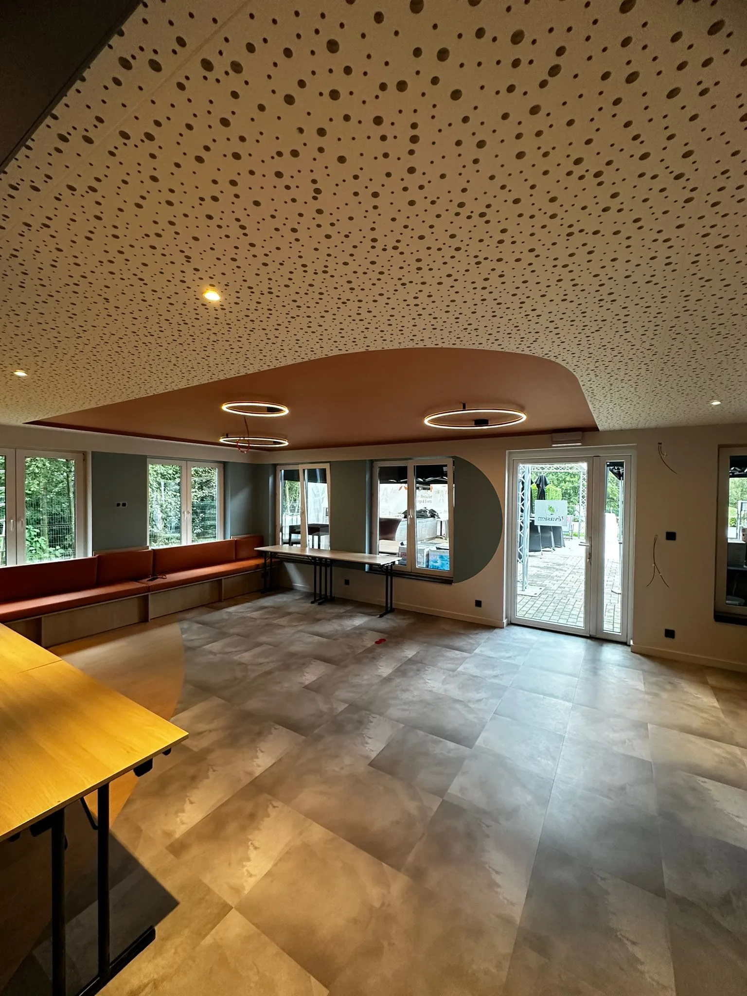 Hotel interior with blue and terracotta accents
