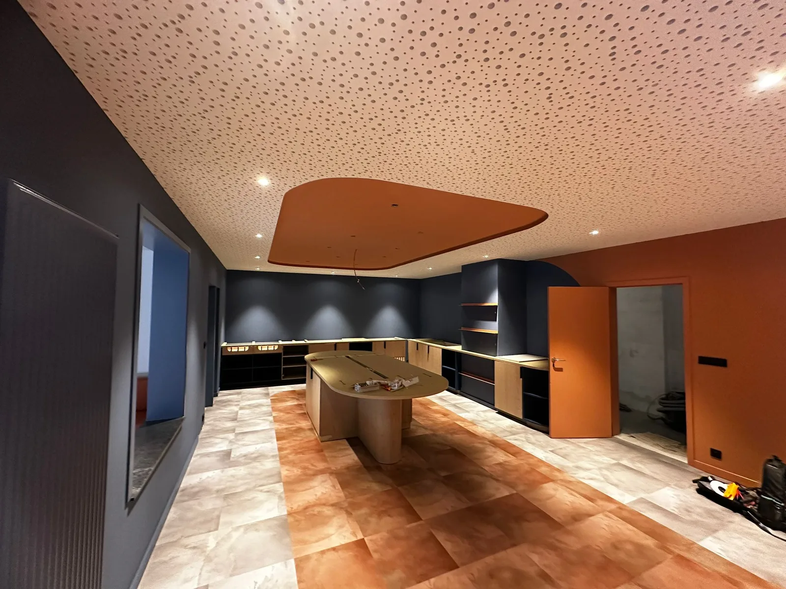 Hotel interior with blue and terracotta accents