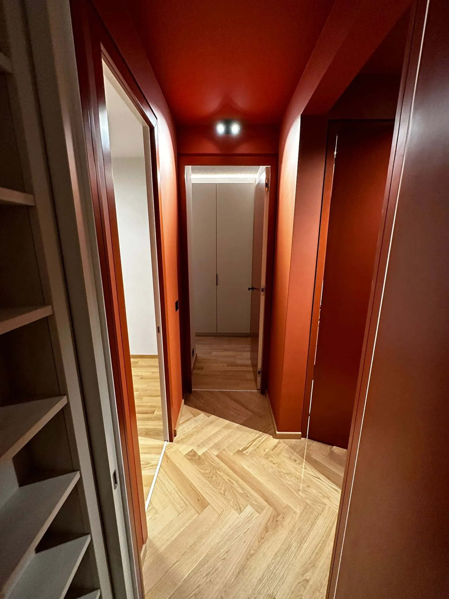 Passage and interior room with coordinated finishes