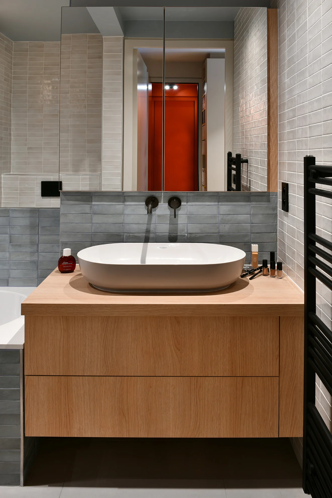 Round basin on a floating timber vanity